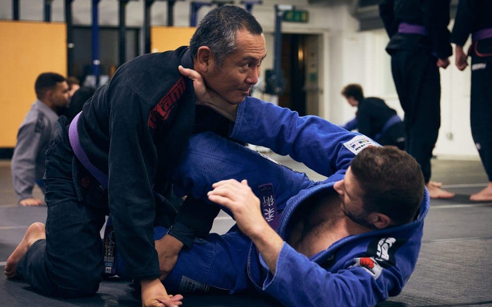 Kingston Jiu Jitsu adult class training on the mats