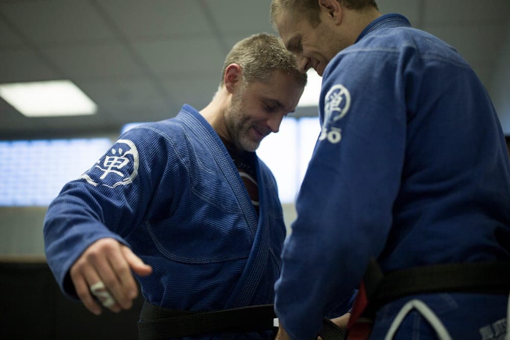 Two Kingston Jiu Jitsu black belt coaches on the mats